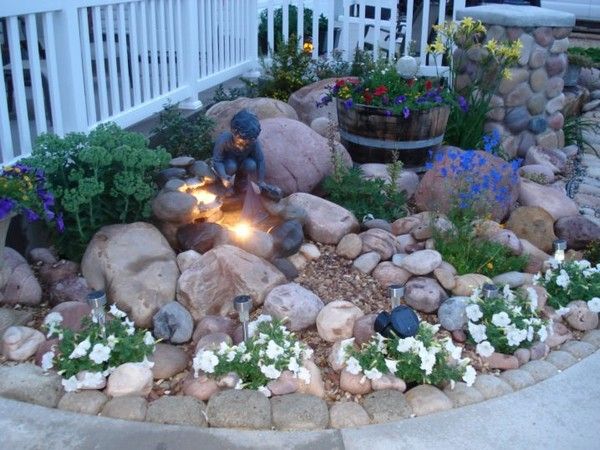 46 Modern & Small Corner Rock Garden Ideas: How to Create a Beautiful and Functional Space A Mini Rockery Stationed At The Front of The House