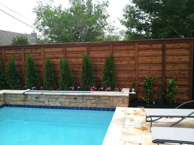 Horizontal wood fencing pool