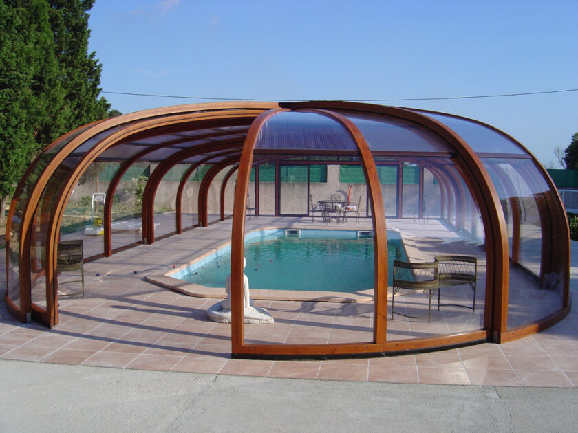 Wood and glass enclosure pool